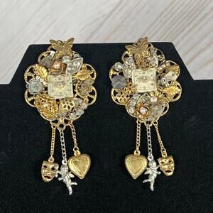 Steampunk earrings with a clock in the middle
